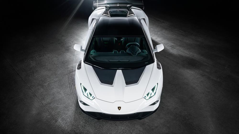 Sleek White Lamborghini Huracan Supercar Spotlight wallpaper