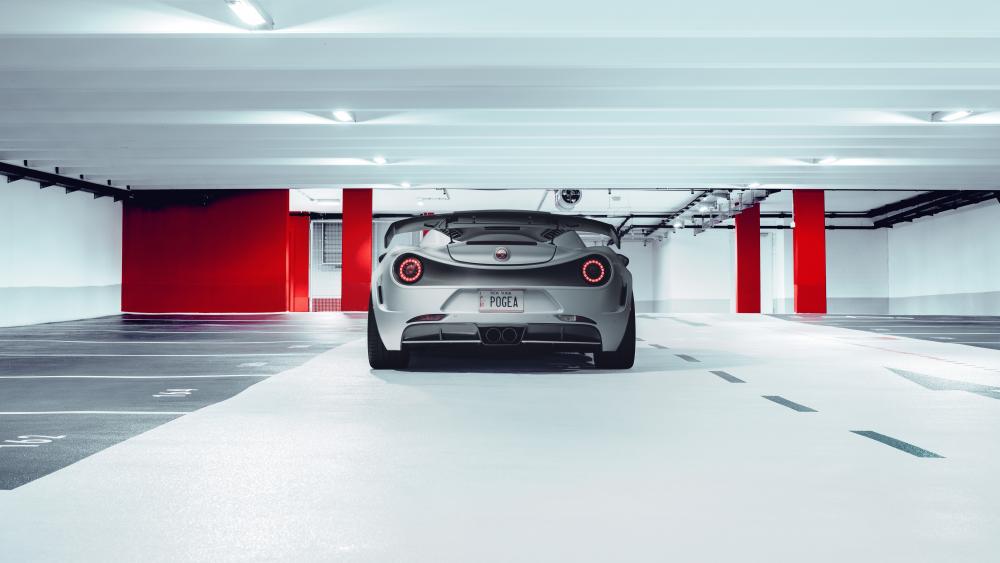 Sleek Alfa Romeo Sports Car in Futuristic Parking Garage wallpaper