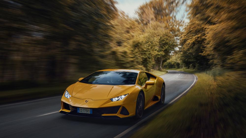 Yellow Lamborghini Huracan EVO - Golden Blaze of Speed on a Forest Road wallpaper