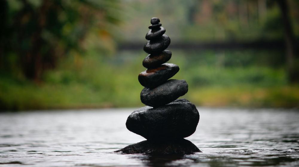 Zen Stones in Tranquil Water wallpaper