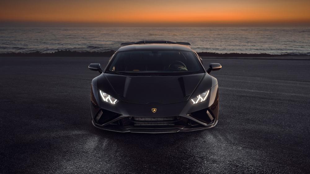 Sunset Drive with a Lamborghini Huracan Luxury Sports Car wallpaper