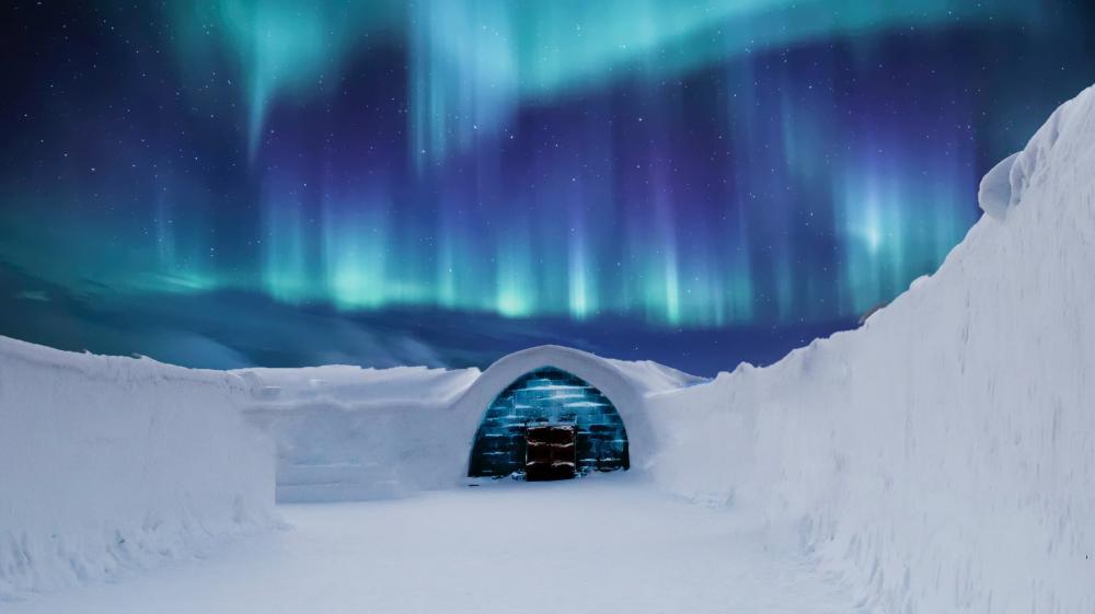 Arctic Glow Over Icy Abode wallpaper