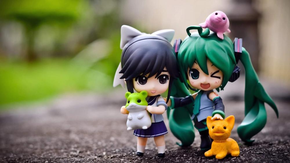 Adorable Anime Figures in a Friendship Pose wallpaper