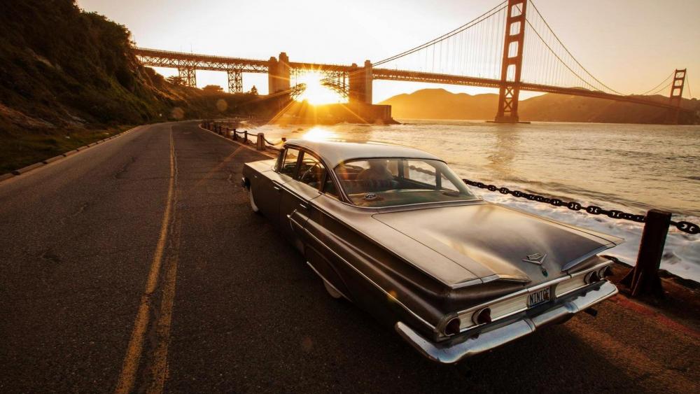 Golden Hour Cruise by the Iconic Bridge wallpaper