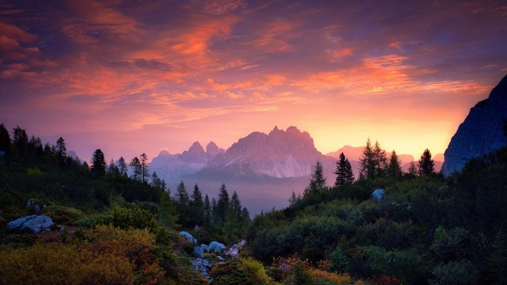 Majestic Sunset Over Dolomite Mountains Peaks wallpaper