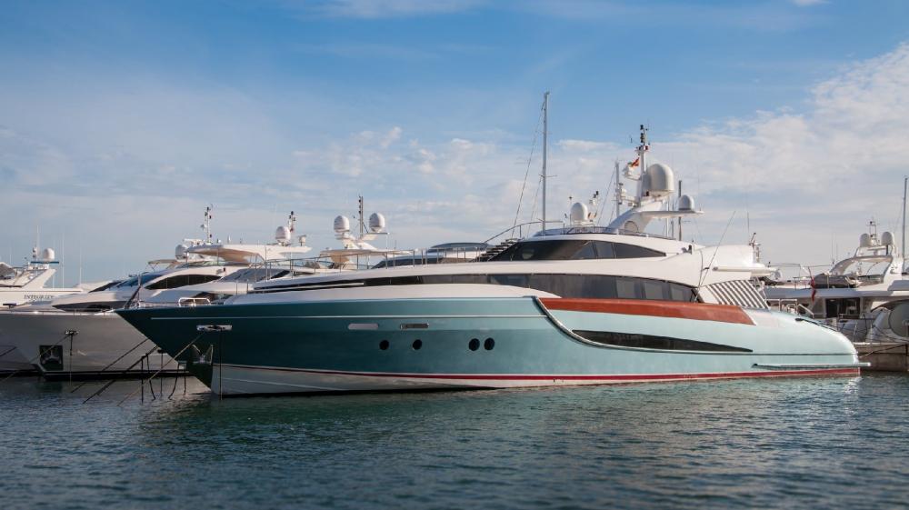Luxury Yachts Anchored in Serene Marina wallpaper