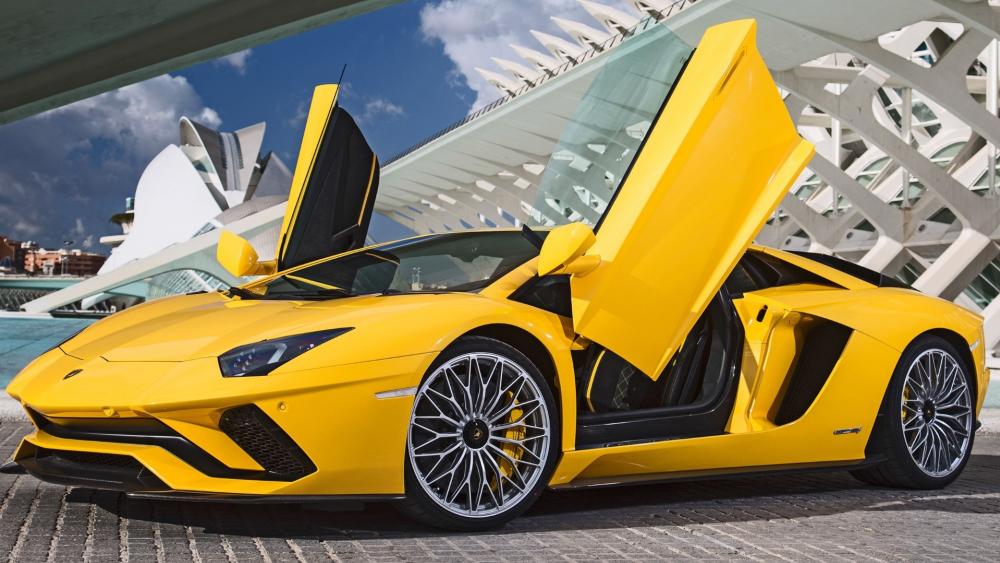 Sleek Yellow Lamborghini Aventador in the City wallpaper