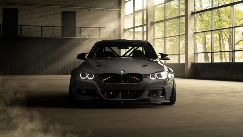 BMW Power in a Shadowy Warehouse wallpaper