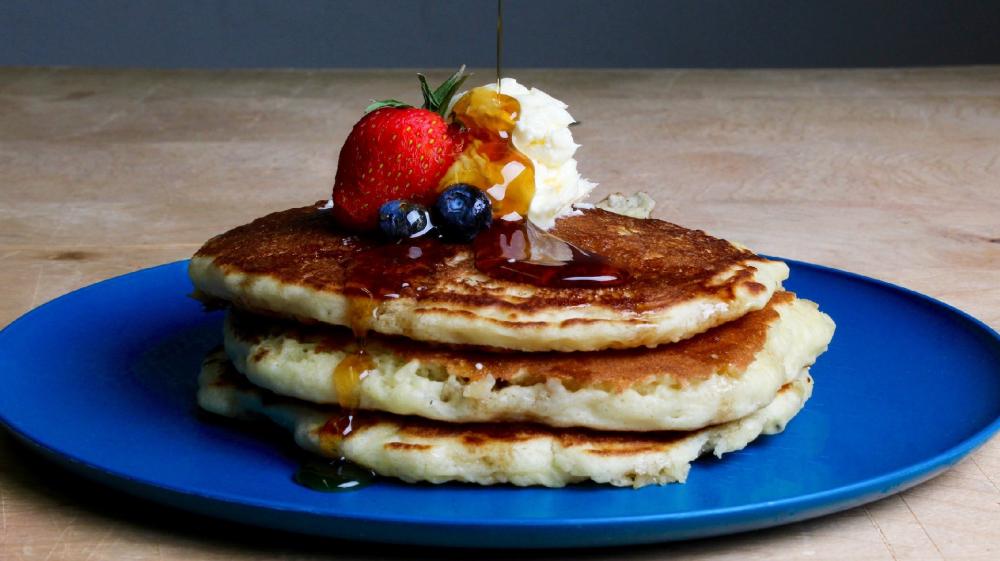 Delicious Pancake Stack with Fresh Berries wallpaper