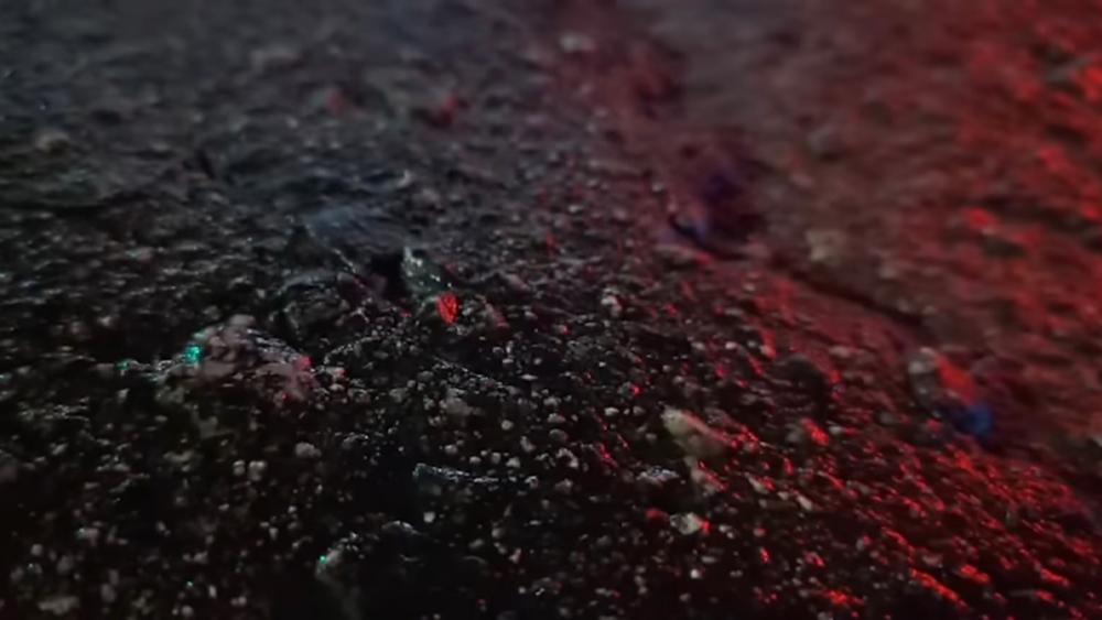 Wet concrete with a red Light wallpaper