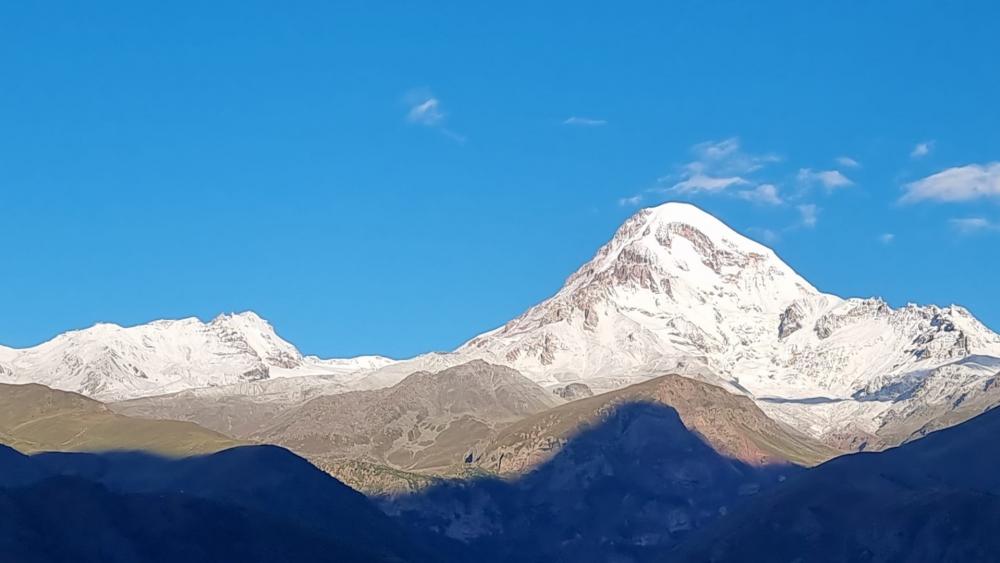 Majestic Snow-Capped Mount Kazbek Peak wallpaper