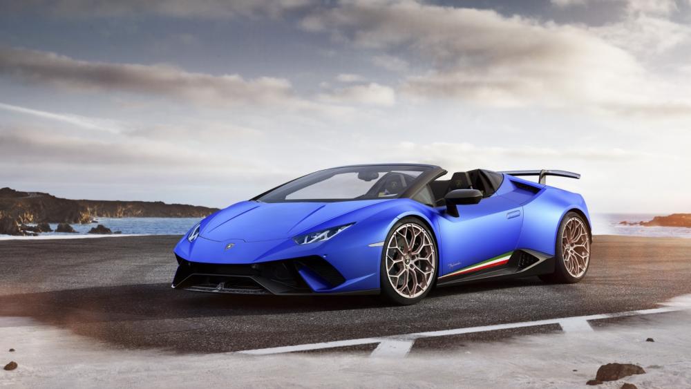 Sleek Blue Lamborghini Huracan Performante Spyder0 Sports Car Dominates Coastal Road wallpaper