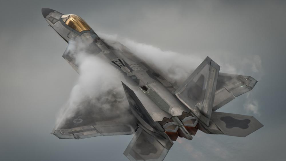 Soaring F-22 Raptor in the Clouds wallpaper
