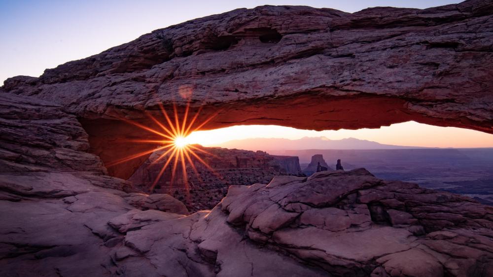 Sunburst Through Mesa Arch wallpaper