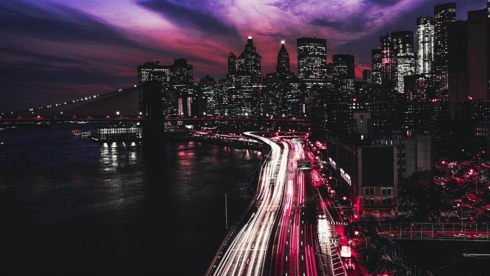 Manhattan Nightscape with Streaming Lights wallpaper