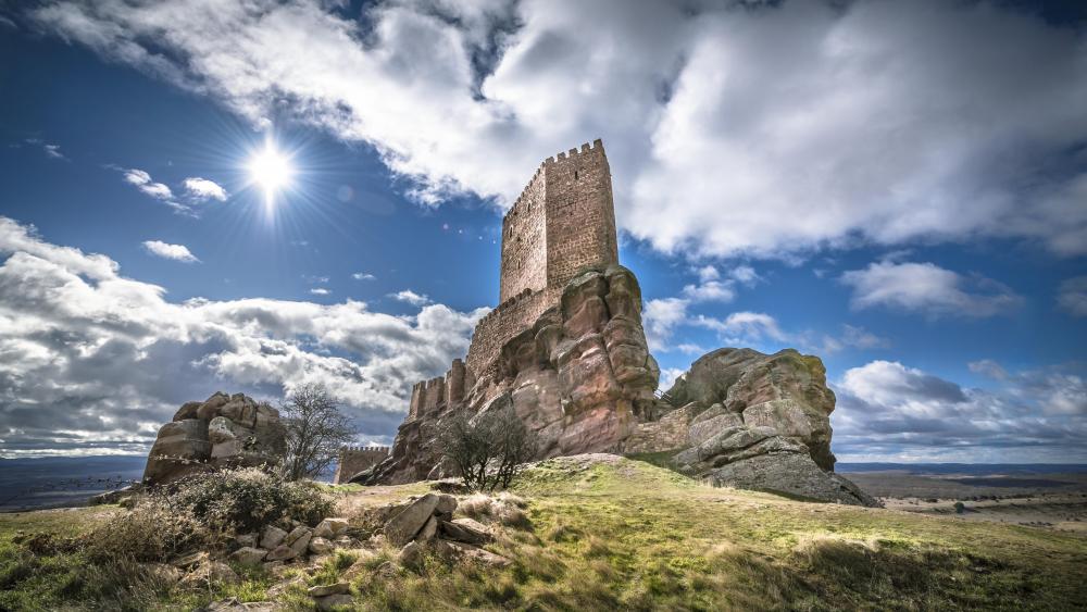 Majestic Castillo de Zafra on Rocky Throne wallpaper