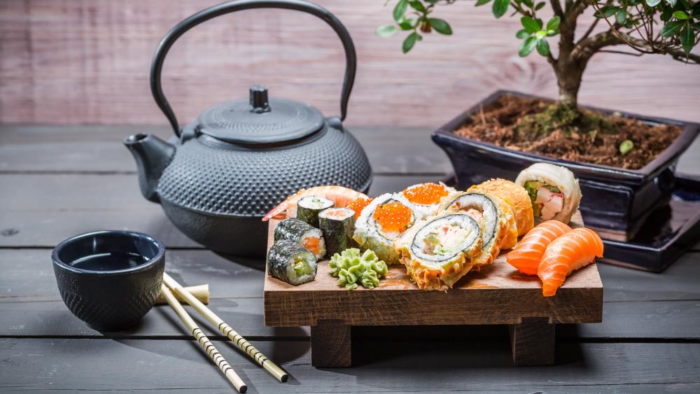 Sushi Feast with Traditional Tea Set wallpaper