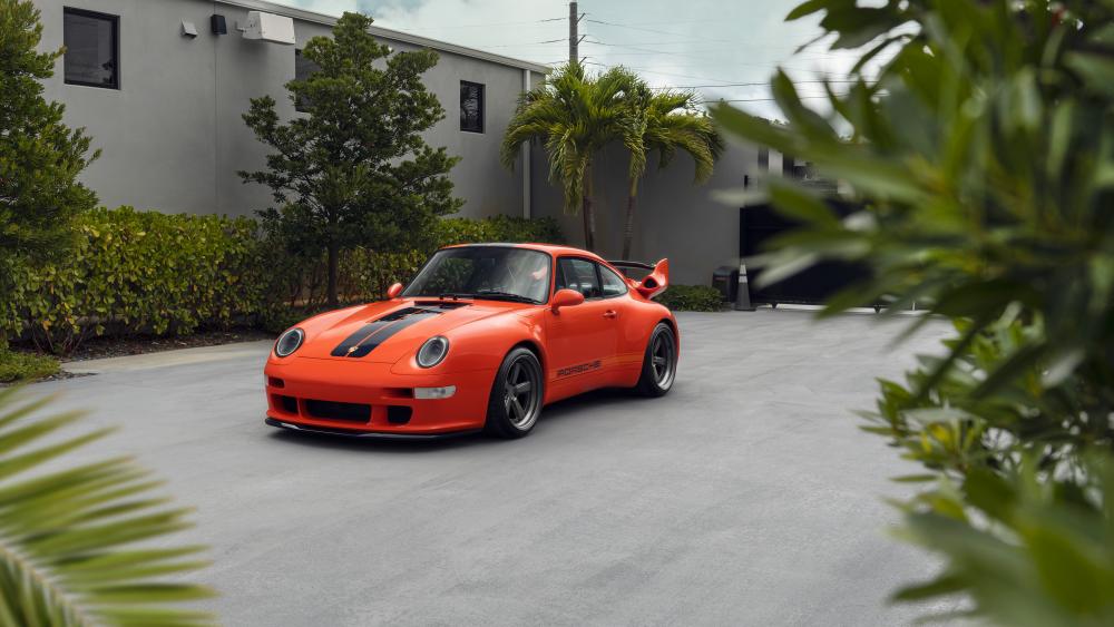 Elegant Porsche 911 in Urban Oasis wallpaper