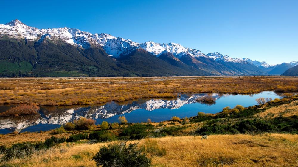 Majestic New Zealand Mountains Reflecting in Serene Lake wallpaper