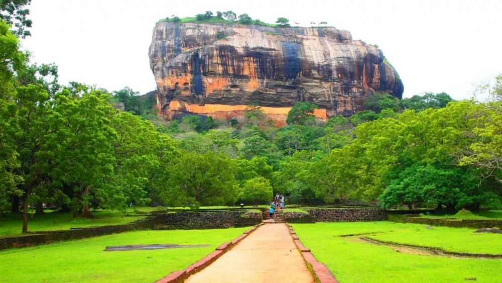 Majestic Sigiriya Rock in Lush Surroundings wallpaper