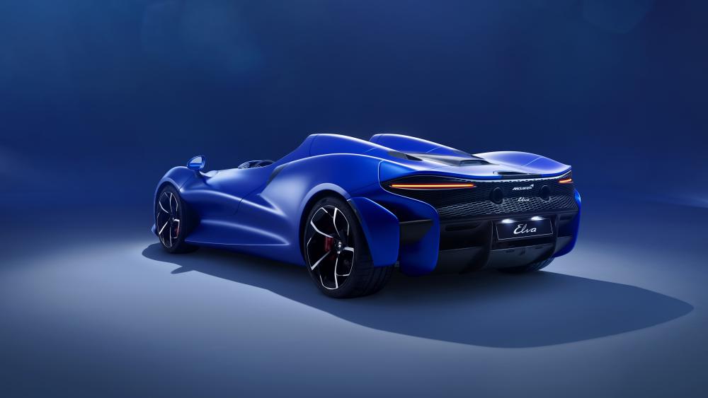 Sleek Blue McLaren Elva in Majestic Pose wallpaper
