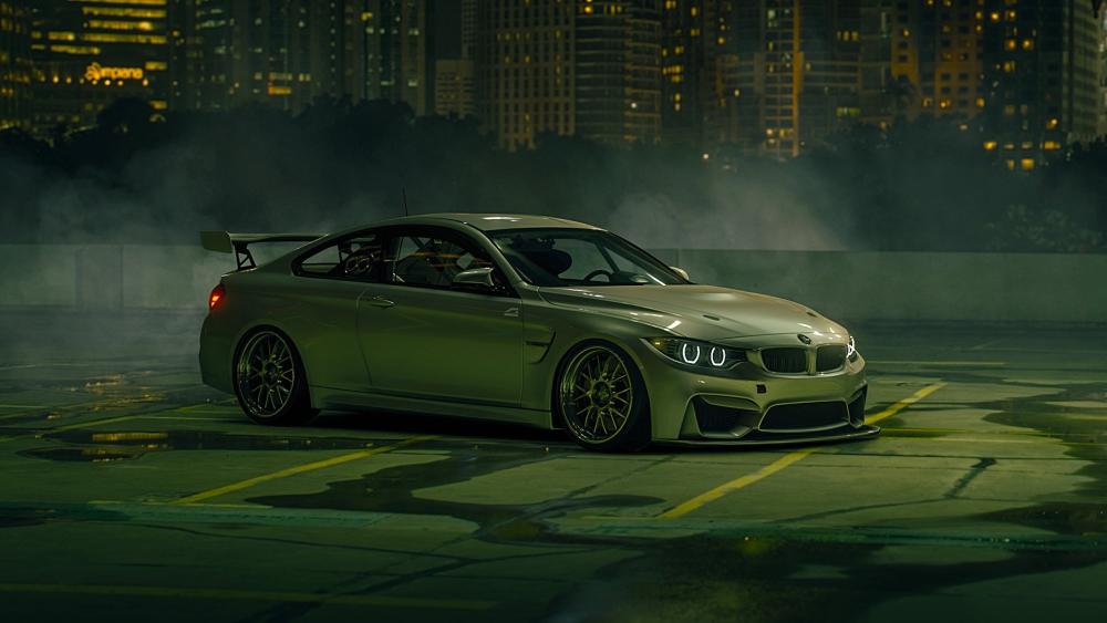 Green BMW M4 Power Stance on Urban Nighttime Background - backiee