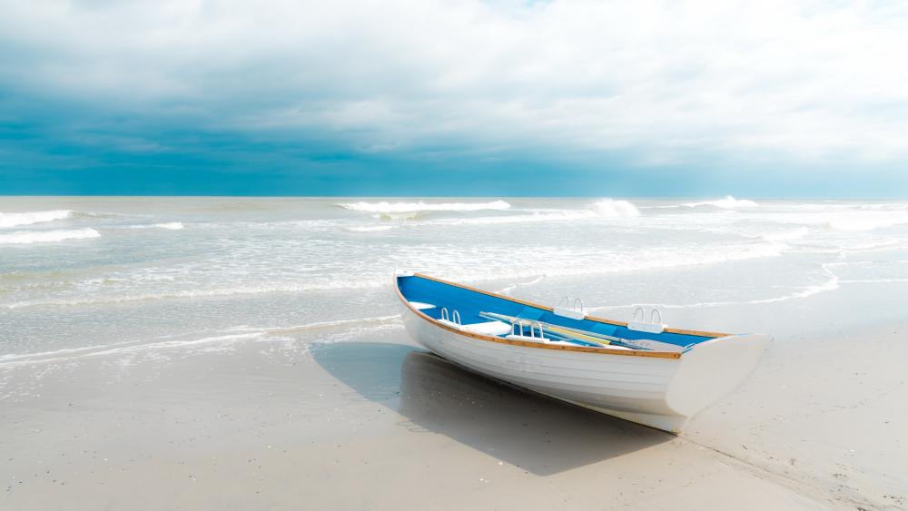 Solitary Boat on a Serene Sandy Beach wallpaper