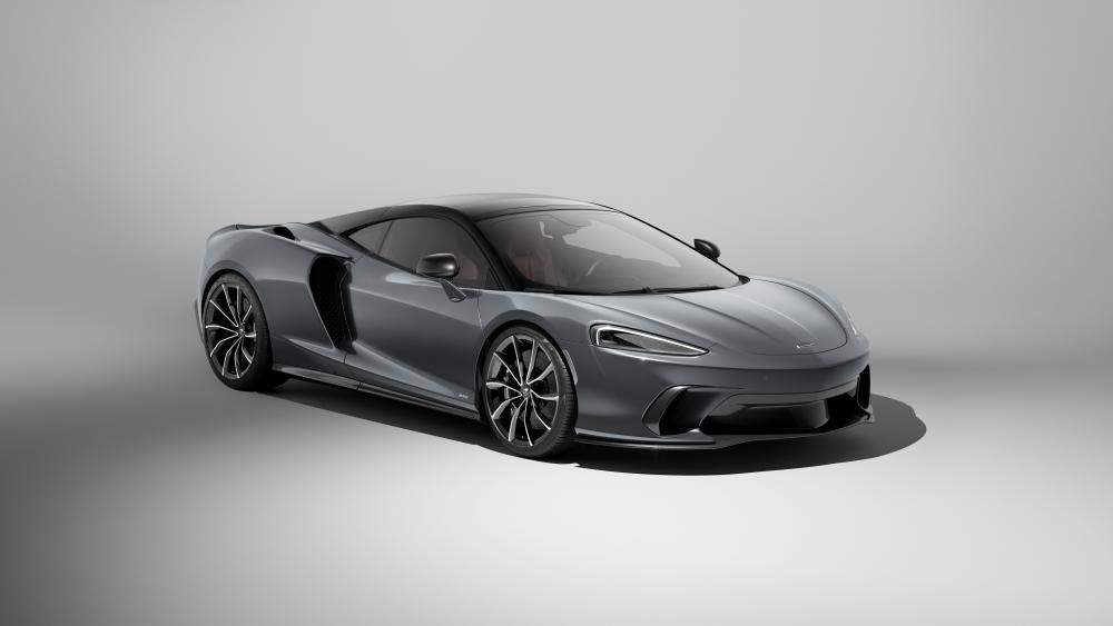 Sleek Grey McLaren GTS in Spotlight wallpaper