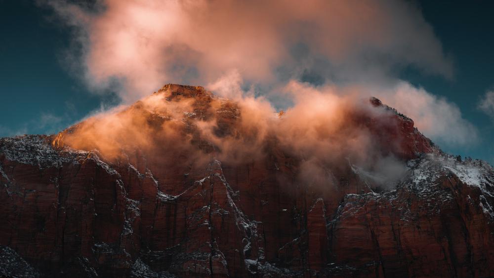 Sunset Glow on Rugged Mountain Peaks wallpaper