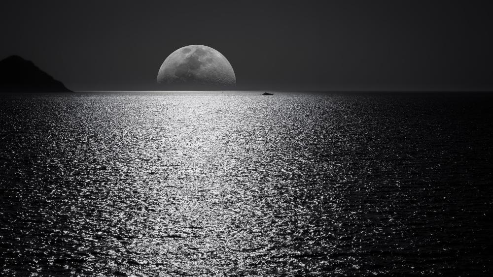 Moonlit Majesty Over Tranquil Seas wallpaper