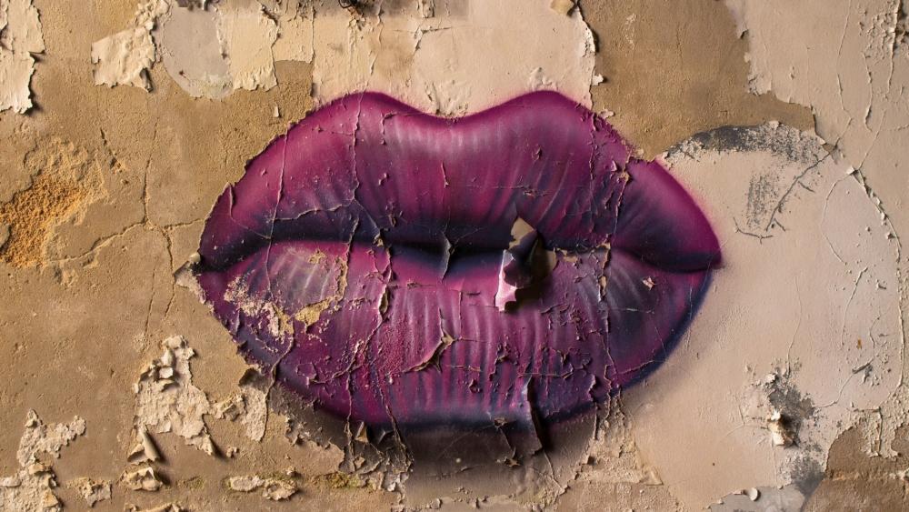 Cracked Wall with Purple Lips Graffiti wallpaper