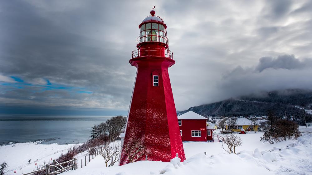 Red Lighthouse in Winter Wonderland wallpaper