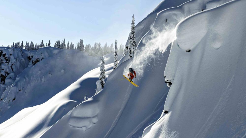 Epic Ski Jump in Pristine Winter Wonderland wallpaper