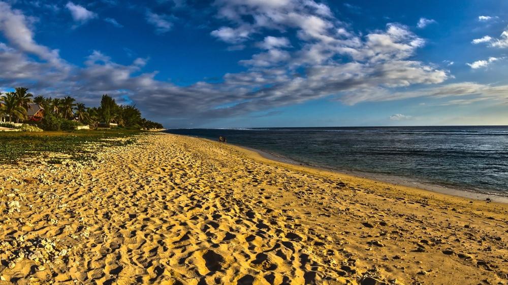 Golden Sands and Tranquil Waves wallpaper