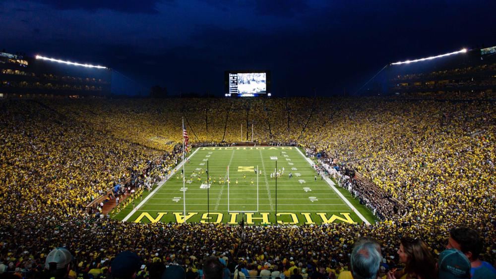 Michigan Stadium Electrifying Night Football wallpaper