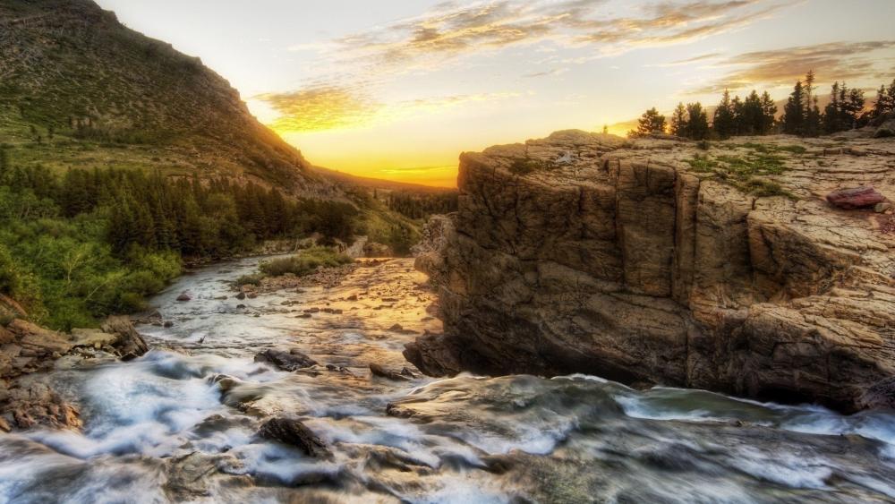 Sunset Over Swiftcurrent River in Glacier National Park wallpaper