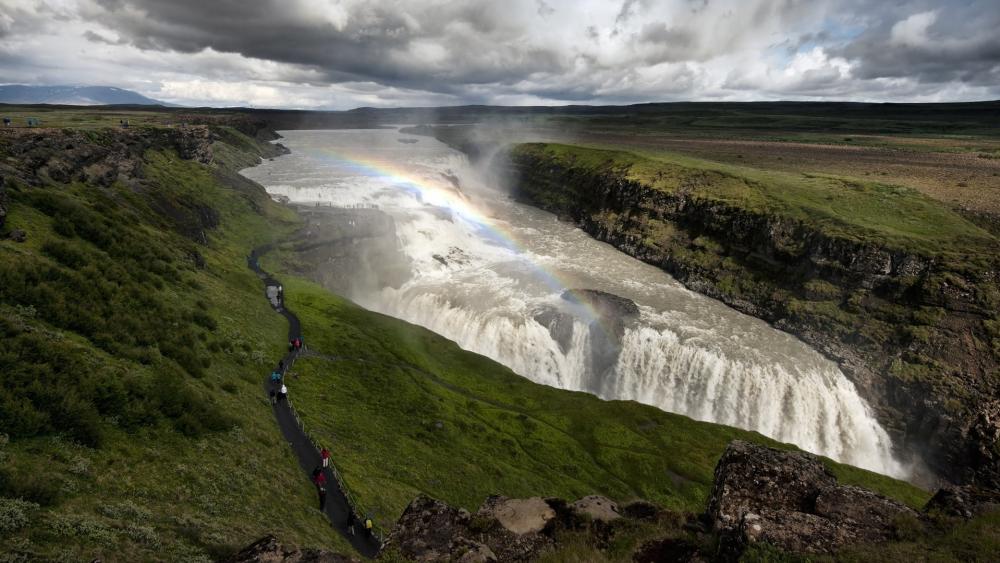 Rainbow Above Majestic Waterfall wallpaper