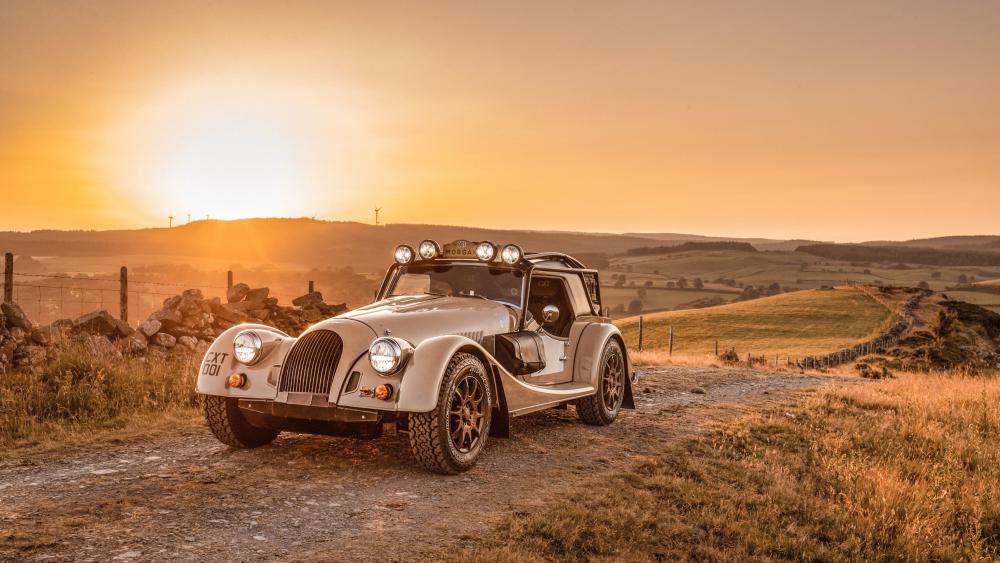 Vintage Road Adventure in Morgan Plus Four CX-T wallpaper