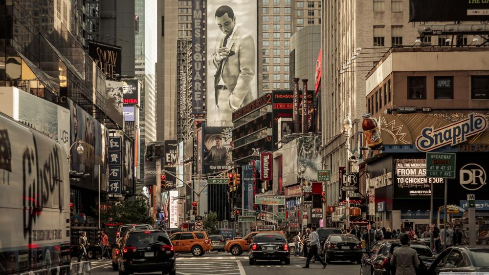 Bustling Times Square in Midtown Manhattan wallpaper