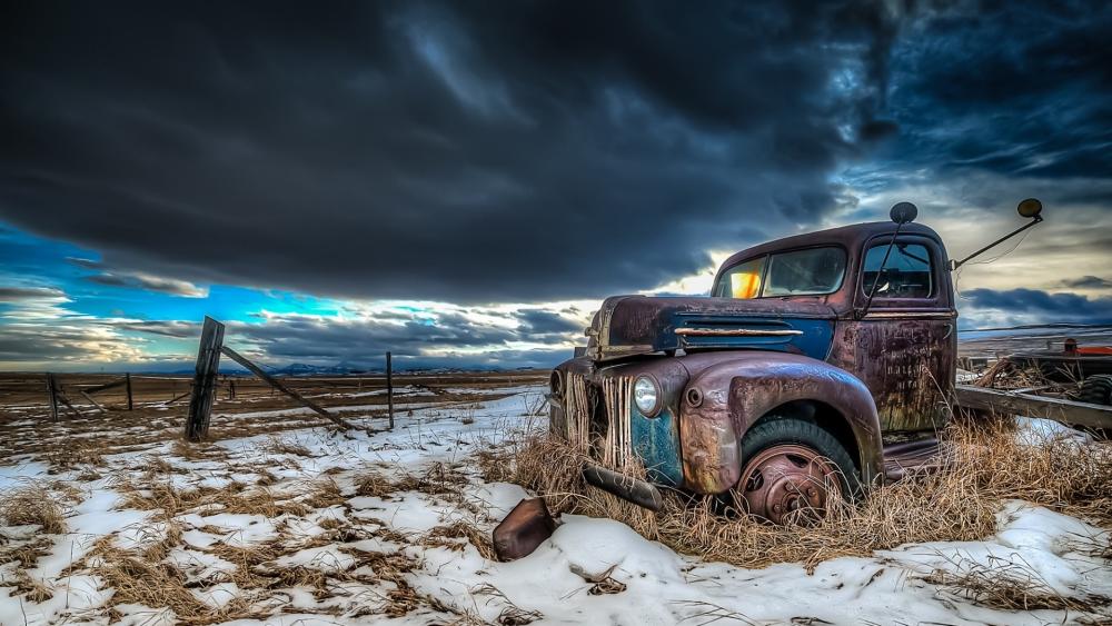 Vintage Pickup Truck in Winter Landscape wallpaper