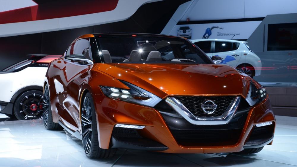 Nissan Maxima: A Vision in Orange wallpaper