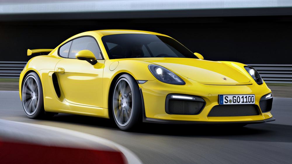 Yellow Porsche Cayman GT4 in Action wallpaper