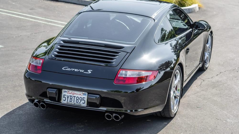 Sleek Black Porsche 911 Carrera S wallpaper