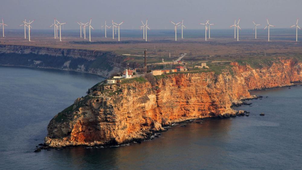 Wind Turbines on Coastal Cliffside wallpaper