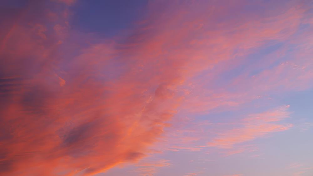 Sunlight and orange clouds. Sunlight colors the clouds perfectly.  wallpaper