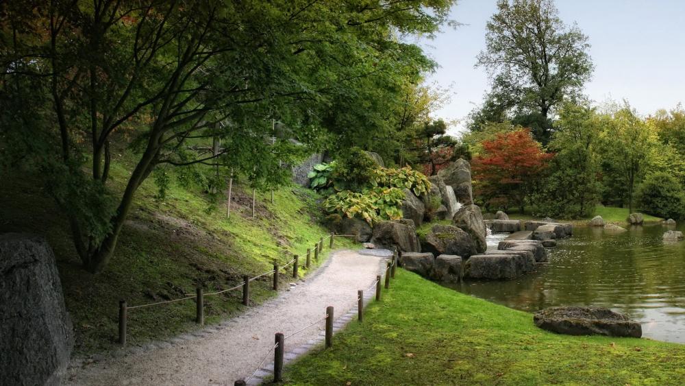 Serene Path in Japanese Garden of Hasselt wallpaper