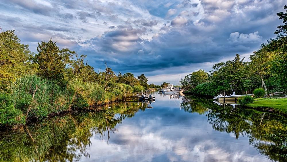 Tranquil River Reflection Scene wallpaper