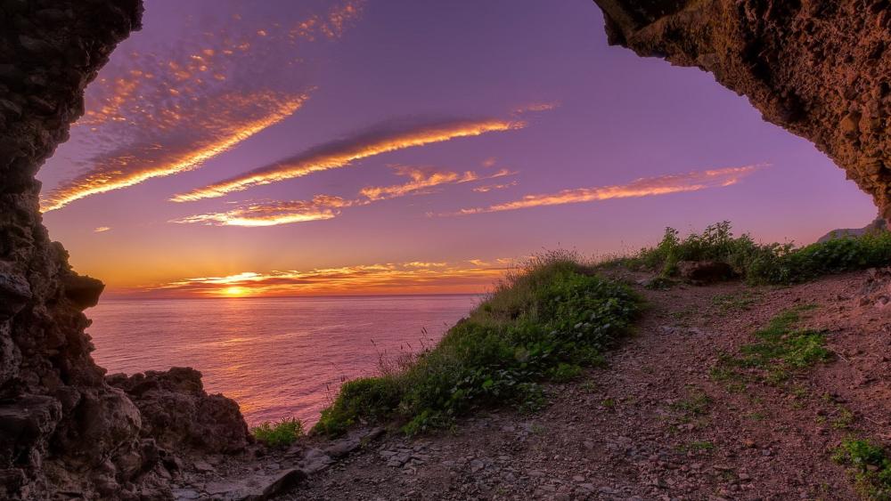 Sunset Through the Sea Cave wallpaper