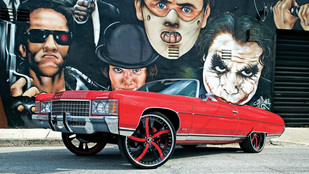 Retro Chevrolet Impala in Urban Art Scene wallpaper