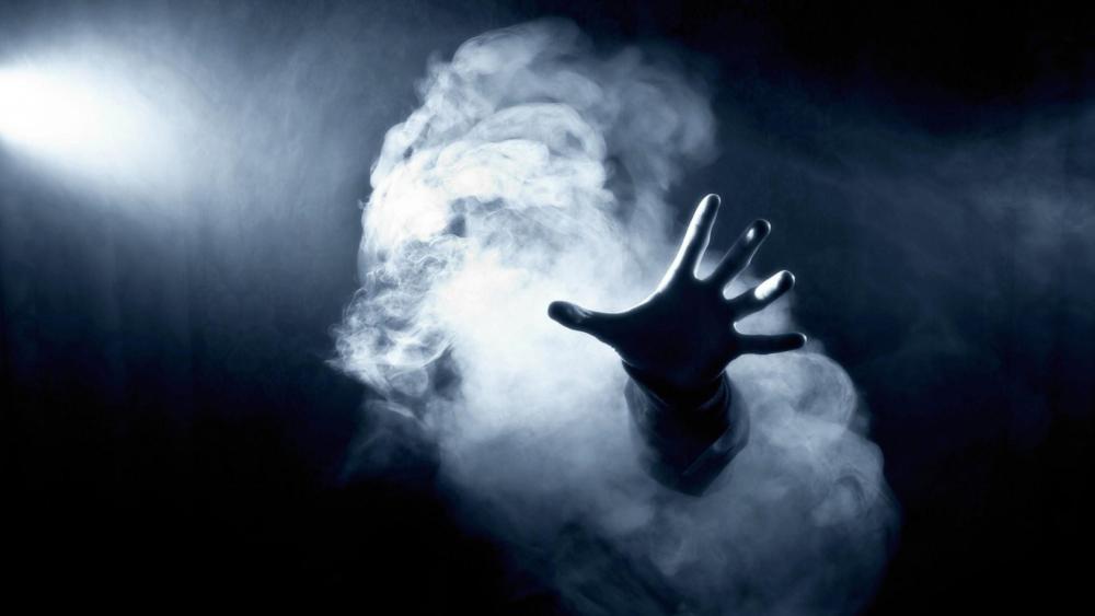 Haunting Spectral Hand in the Mist wallpaper